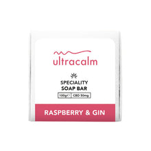 Load image into Gallery viewer, A white soap bar package labeled &quot;Ultracalm 50mg CBD Soap 100g&quot; in black text. It contains 100g with CBD 50mg and natural essential oils. The bottom section is pink with &quot;RASPBERRY &amp; GIN&quot; in white text.
